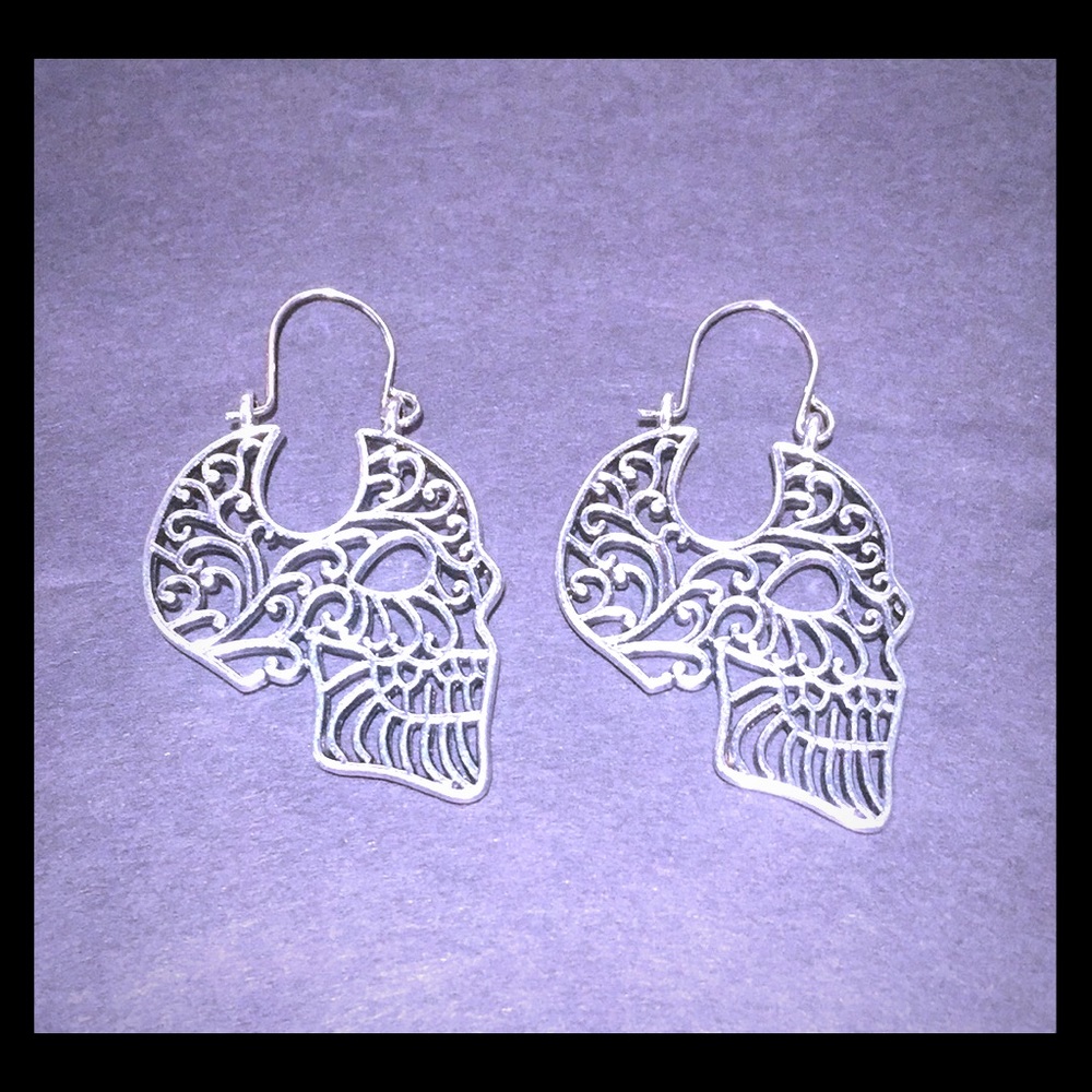 Silver Dia de los Muertos Sugar Skull earrings.